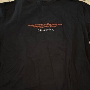FRIENDS Black Tee with Orange Quote